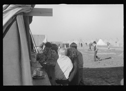 Untitled photo, possibly related to: Part of the mess line at mealtime in camp for white flood refugees at Forrest City, Arkansas