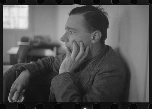 Walker Evans, profile, hand up to face