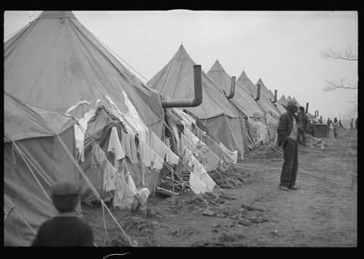 Untitled photo, possibly related to: Flood refugees lined up and waiting for food at Marianna, Arkansas, refugee camp