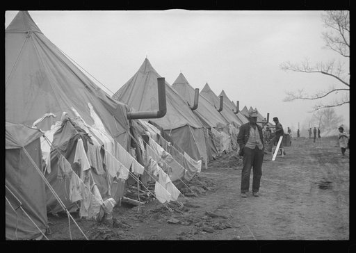 Untitled photo, possibly related to: Flood refugees lined up and waiting for food at Marianna, Arkansas, refugee camp