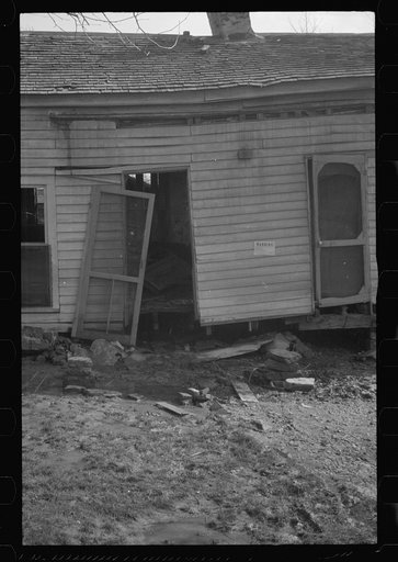 Untitled photo, possibly related to: Interior of house demolished by flood of 1937, Smithland, Kentucky