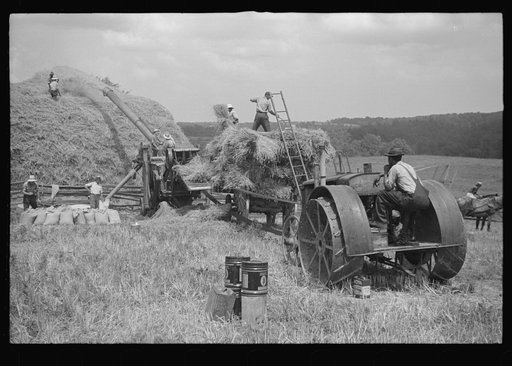 Untitled photo, possibly related to: Brookeville, Maryland. Baling hay