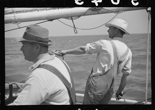 Untitled photo, possibly related to: Summer residents watch the tourist boat arrive from Boston, Provincetown, Massachusetts