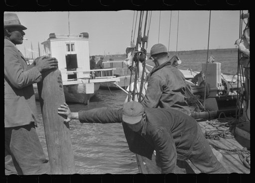 Untitled photo, possibly related to: Aboard a trap fishing boat. The deck of the boat on the way home. Provincetown, Massachusetts