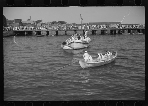Untitled photo, possibly related to: Summer residents watch the tourist boat arrive from Boston, Provincetown, Massachusetts