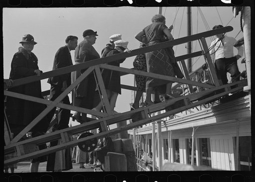 Tourists getting aboard the "Steel Pier" on their return trip to Boston. During the season two boats arrive daily at two, leave about four, bringing and taking hundreds. Provincetown, Massachusetts