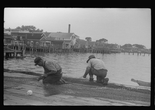 Untitled photo, possibly related to: Fishermen repairing nets, Provincetown, Massachusetts