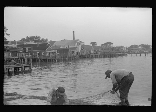 Untitled photo, possibly related to: Fishermen repairing nets, Provincetown, Massachusetts