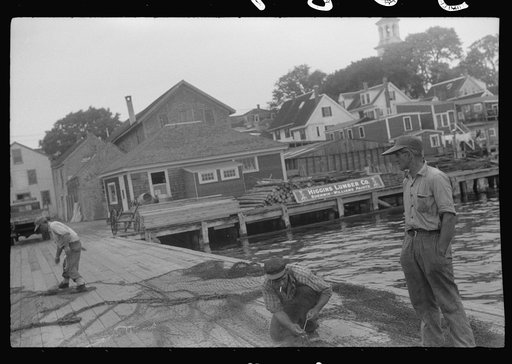 Untitled photo, possibly related to: Fishermen repairing nets, Provincetown, Massachusetts