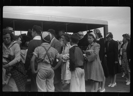 Untitled photo, possibly related to: Tourists, fresh off the boat from Boston. With only two hours in town, they buy seashells dinners, trinkets and rides on the sight seeing bus. Provincetown, Massachusetts