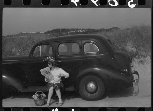 Untitled photo, possibly related to: Beach scene at "New Beach," the most popular beach near Provincetown. Regular bus service makes this beach easily available; lack of bath houses causes a great deal of picturesque dressing and undressing in and behind parked cars. Provincetown, Massachusetts