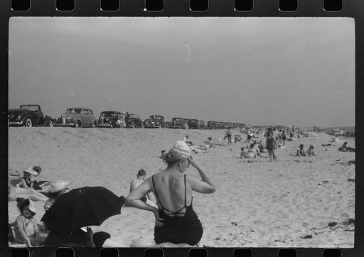 Untitled photo, possibly related to: Beach scene at "New Beach," the most popular beach near Provincetown. Regular bus service makes this beach easily available; lack of bath houses causes a great deal of picturesque dressing and undressing in and behind parked cars. Provincetown, Massachusetts