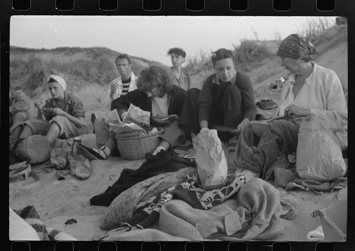 Untitled photo, possibly related to: Beach scene at "New Beach," the most popular beach near Provincetown. Regular bus service makes this beach easily available; lack of bath houses causes a great deal of picturesque dressing and undressing in and behind parked cars. Provincetown, Massachusetts