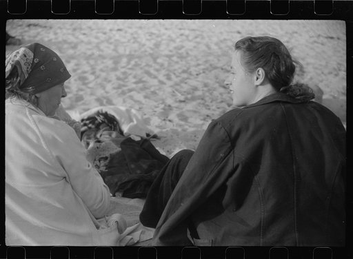 Untitled photo, possibly related to: Beach scene at "New Beach," the most popular beach near Provincetown. Regular bus service makes this beach easily available; lack of bath houses causes a great deal of picturesque dressing and undressing in and behind parked cars. Provincetown, Massachusetts