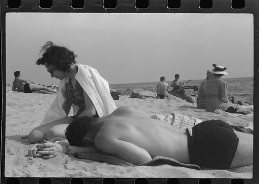Untitled photo, possibly related to: Beach scene at "New Beach," the most popular beach near Provincetown. Regular bus service makes this beach easily available; lack of bath houses causes a great deal of picturesque dressing and undressing in and behind parked cars. Provincetown, Massachusetts