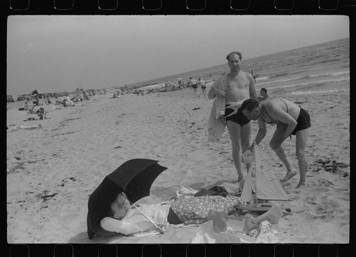 Untitled photo, possibly related to: Beach scene at "New Beach," the most popular beach near Provincetown. Regular bus service makes this beach easily available; lack of bath houses causes a great deal of picturesque dressing and undressing in and behind parked cars. Provincetown, Massachusetts