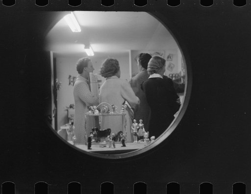 Untitled photo, possibly related to: Shoppers at night in souvenir store, Provincetown, Massachusetts