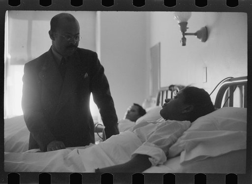 Untitled photo, possibly related to: Staff doctor entering Provident Hospital, Chicago, Illinois