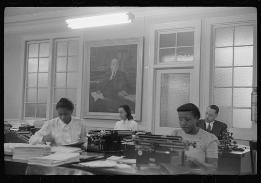 Untitled photo, possibly related to: Employees of Negro insurance company, Chicago, Illinois