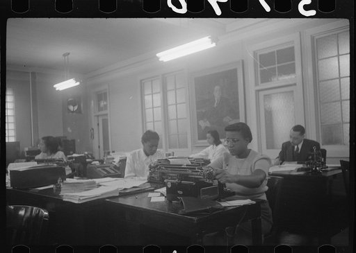 Untitled photo, possibly related to: Employees of Negro insurance company, Chicago, Illinois