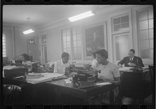 Untitled photo, possibly related to: Employees of Negro insurance company, Chicago, Illinois