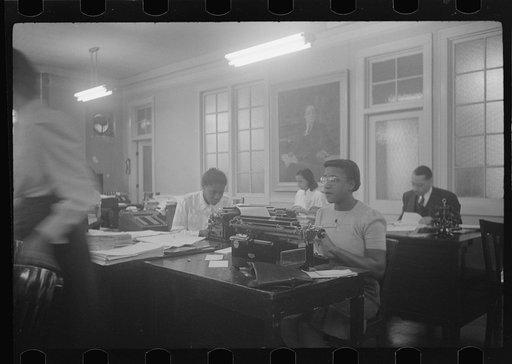 Untitled photo, possibly related to: Employees of Negro insurance company, Chicago, Illinois