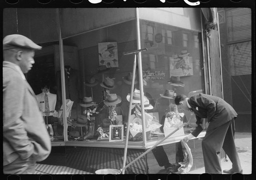 Untitled photo, possibly related to: Books on display in show store window, 47th Street, Chicago, Illinois
