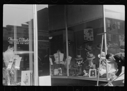 Untitled photo, possibly related to: Books on display in show store window, 47th Street, Chicago, Illinois