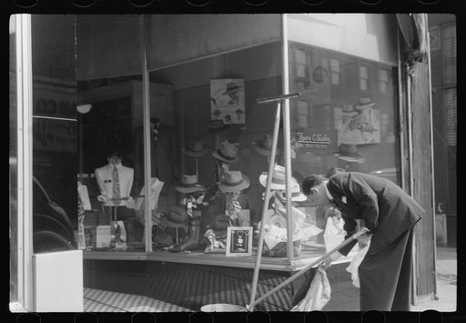 Untitled photo, possibly related to: Books on display in show store window, 47th Street, Chicago, Illinois