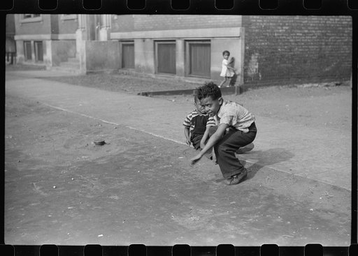 Untitled photo, possibly related to: Children playing on the street, Chicago, Illinois