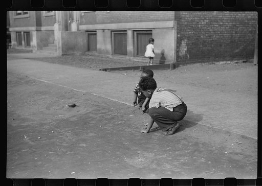Untitled photo, possibly related to: Children playing on the street, Chicago, Illinois