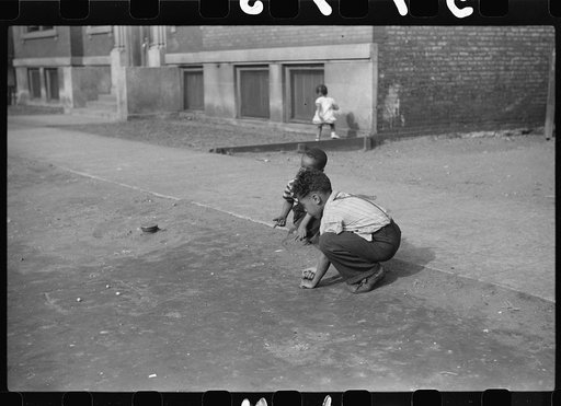 Untitled photo, possibly related to: Children playing on the street, Chicago, Illinois