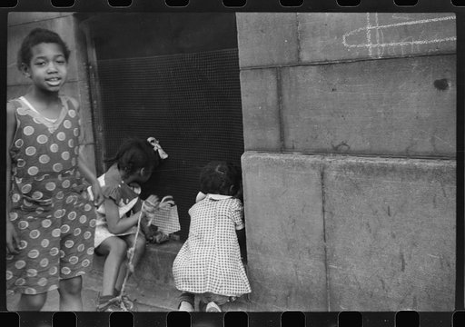 Untitled photo, possibly related to: Children playing on the street, Chicago, Illinois