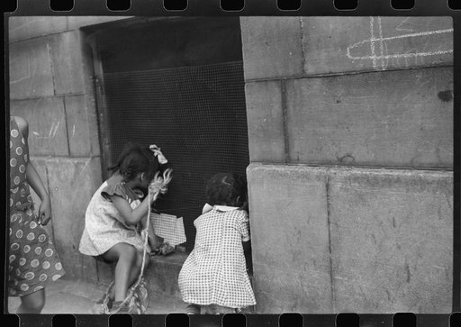 Untitled photo, possibly related to: Children playing on the street, Chicago, Illinois
