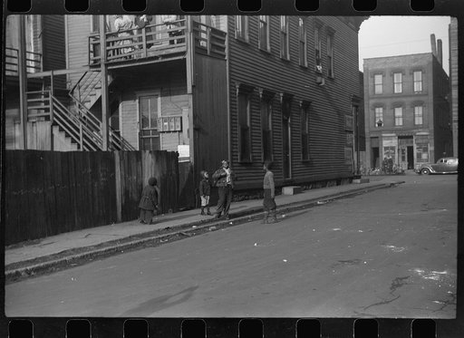 Untitled photo, possibly related to: Negroes in front of their home, Black Belt, Chicago, Illinois