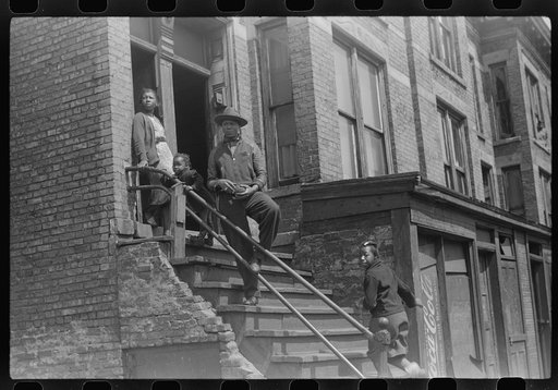 Negroes in front of their home, Black Belt, Chicago, Illinois