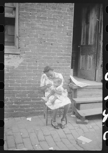 Untitled photo, possibly related to: Mother and child. Alley dwelling area. Washington, D.C.