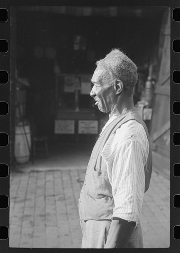Untitled photo, possibly related to: Travelling evangelist, alley dwelling section, Washington, D.C.