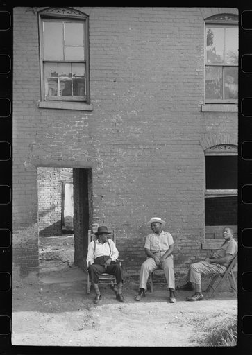 Untitled photo, possibly related to: Negroes in front of their homes in the alley dwelling area, Washington, D.C.