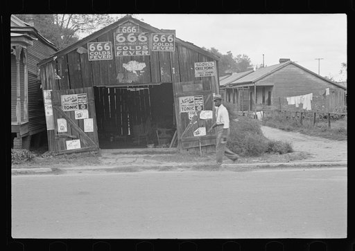 Advertisements for popular malaria cure, Natchez, Mississippi