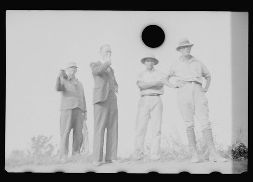 Untitled photo, possibly related to: Tomb painter in cemetery at Pointe a la Hache, Louisiana
