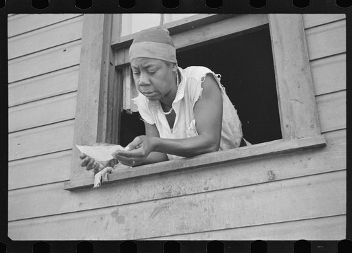 Colored inhabitant of Scotts Run, West Virginia, who has just received relief check