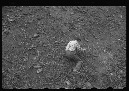 Man salvaging coal; they receive ten cents per hundred pound sack or two dollars a ton, one man can make from ten to twenty sacks a day, Nanty Glo, Pennsylvania
