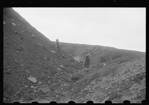 Untitled photo, possibly related to: Man salvaging coal; they receive ten cents per hundred pound sack or two dollars a ton, one man can make from ten to twenty sacks a day, Nanty Glo, Pennsylvania