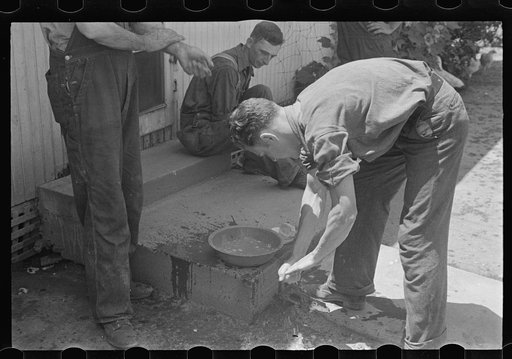 Washing up for dinner during wheat harvest, central Ohio