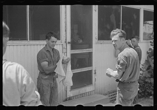 Untitled photo, possibly related to: Washing up for dinner during wheat harvest, central Ohio