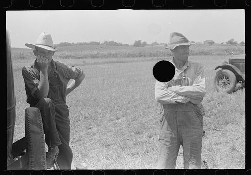 Untitled photo, possibly related to: Member of threshing crew, central Ohio