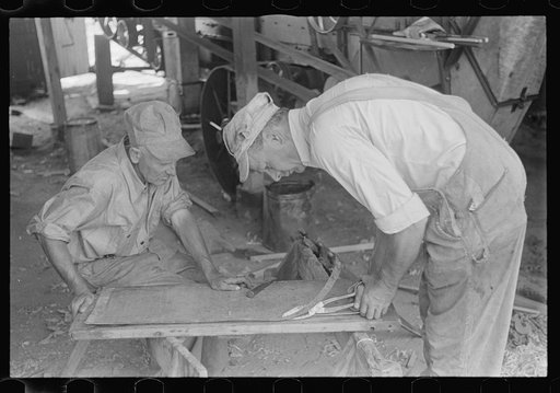 Repairing the thresher, central Ohio