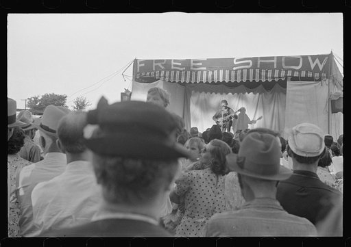 Untitled photo, possibly related to: Ashville, Ohio. Sideshows at the Fourth of July celebration