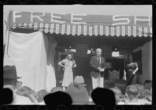 Untitled photo, possibly related to: Ashville, Ohio. Sideshows at the Fourth of July celebration